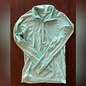 Lululemon aqua half zip - size 8